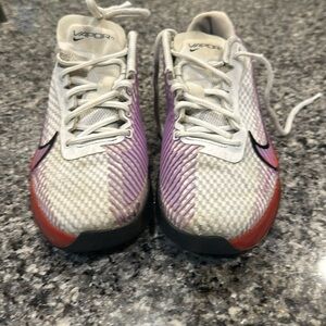 Vapor 11 Nike court shoes
Size men’s 7.5